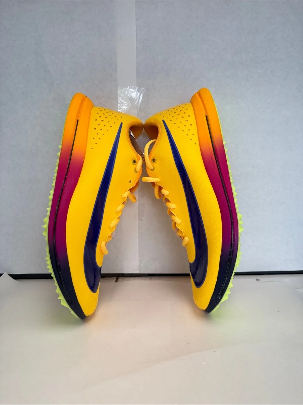 Nike Yellow Track Spikes with Blue Swoosh and Purple Gradient Midsole size 11